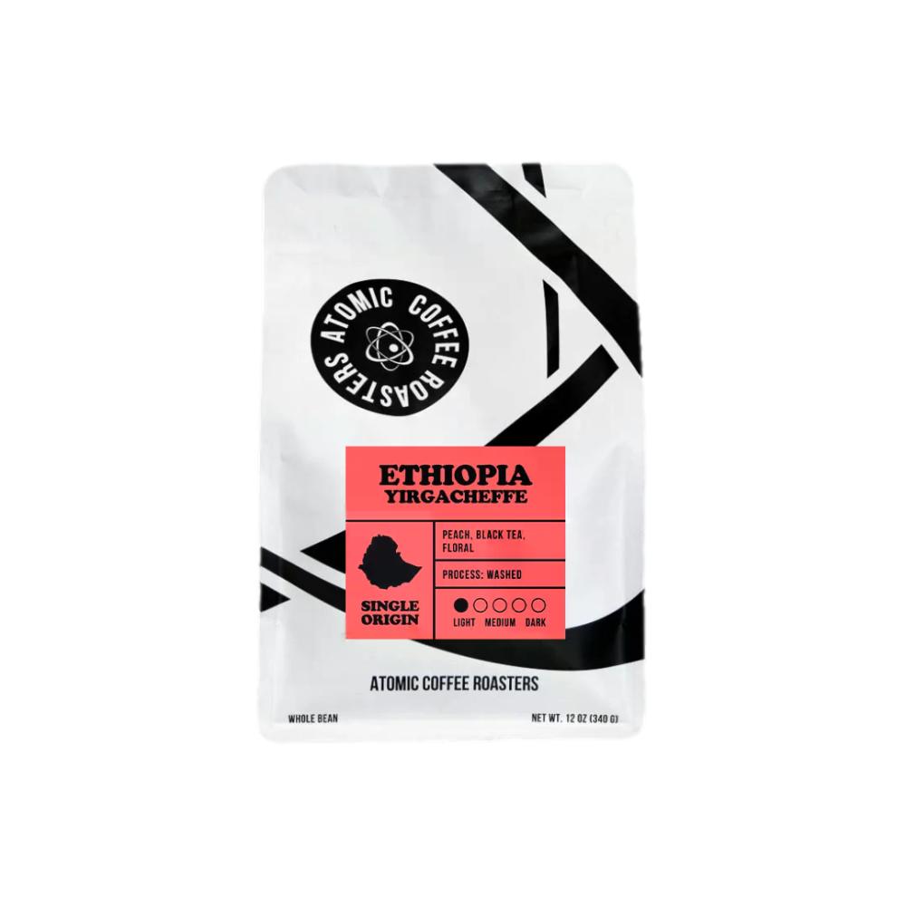 A stand-up pouch of Atomic Coffee Roasters Ethiopia Yirgacheffe single-origin coffee on a plain white background. – Atomic Coffee Roasters main product