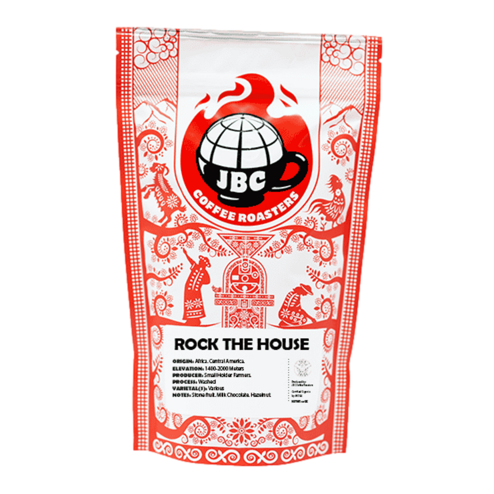 A bag of JBC Coffee Roasters 'Rock the House' blend coffee, with a red and white design featuring decorative patterns and the JBC logo. – JBC Coffee Roasters main product