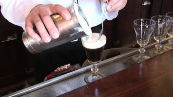 Barista creating an Irish Coffee at the Balboa Cafe