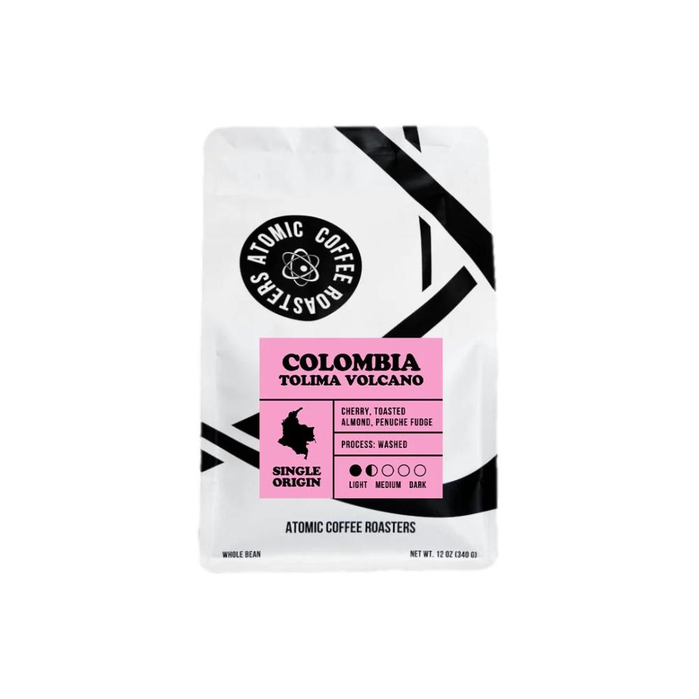 Coffee package labeled 'Colombia Tolima Volcano' by Atomic Coffee Roasters on a white background – Atomic Coffee Roasters main product