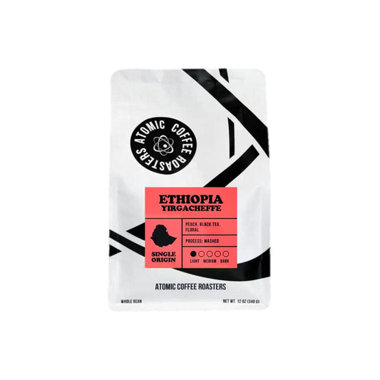 A stand-up pouch of Atomic Coffee Roasters Ethiopia Yirgacheffe single-origin coffee on a plain white background.