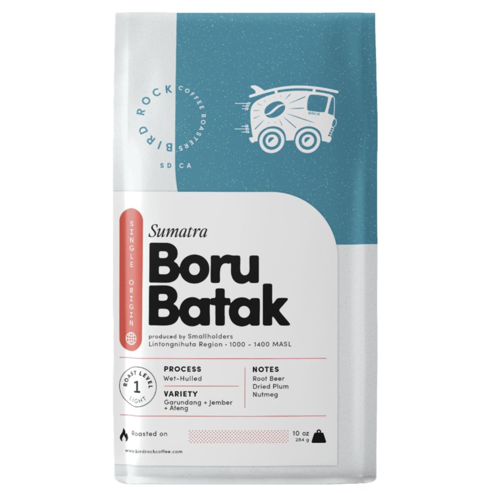 Coffee bag labeled 'Sumatra Boru Batak' with branding and product details on a white background