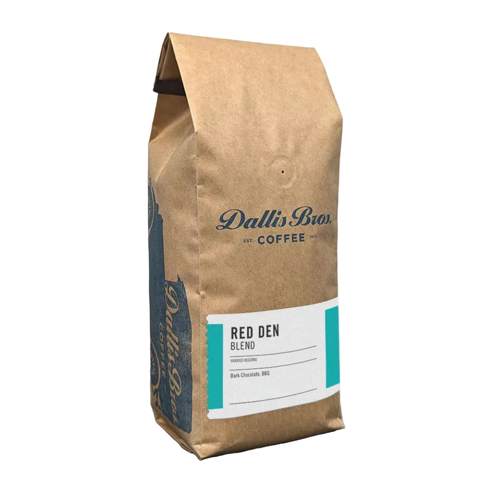 A 12 oz bag of Dallin Bior Red Den Coffee Blend in a brown kraft paper bag with a white and teal label, shown on a plain white background. – Dallis Bros. Coffee main product