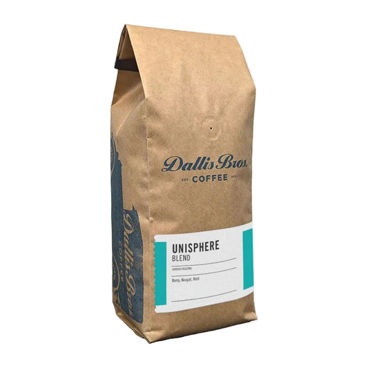A bag of Dallin Bior Coffee Unisphere Blend medium roast coffee in a brown kraft paper bag with a white and teal label, shown on a plain white background.
