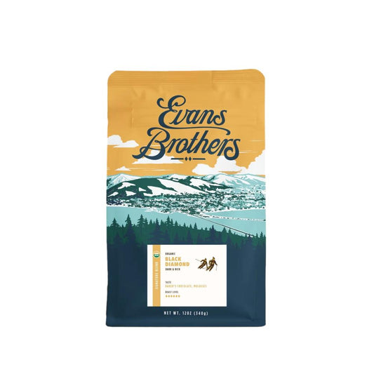 Evans Brothers coffee package with mountain and forest design on a white background