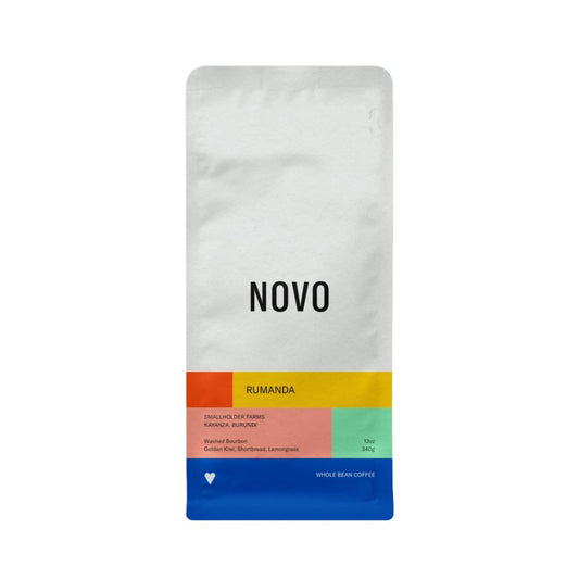Coffee bag labeled 'NOVO' with colorful design on a white background