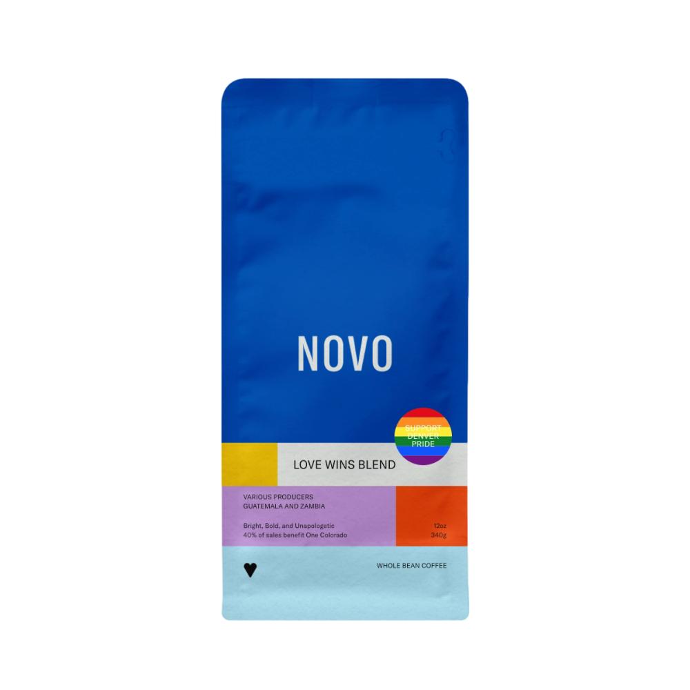 Blue coffee bag with 'NOVO' branding and a rainbow logo on a white background