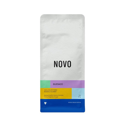 Coffee bag labeled 'NOVO' with a colorful label on a white background